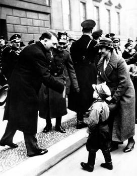1934. The youngster is wearing the uniform of Hitler's Sturmabteilung.jpg