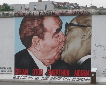 Berlin Wall, showing the famous kiss between Brezhnev and Honecker.jpg