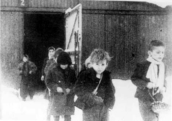 Children leave Birkenau barracks after being liberated.jpg
