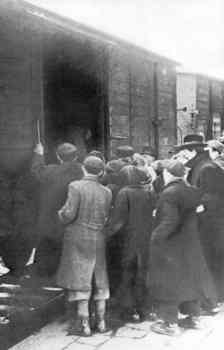 Cracow Jews boarding a boxcar for deportation.jpg