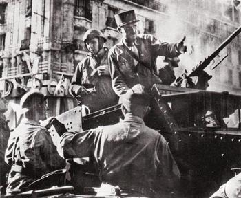 General Jacques Phillippe Leclerc directing French action in Paris from his half-track.jpg