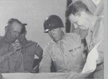 General McNair (left) and Maj. Gen. George S. Patton, Jr., Studying a Map.jpg
