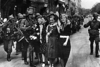 German soldiers greeted by Latvian women in Riga during their occupation - July 1941.jpg