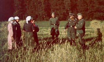Himmler and his entourage with local peasants in Belarus while touring the operation zones of the.jpg