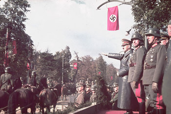 Hitler views the victory parade in Warsaw 1939.jpg