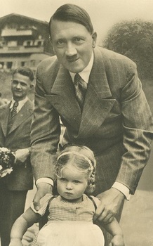 Hitler_with_a_small_visitor_of_Obersalzberg.jpg