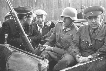 It shows a German, a Russian and a Polish soldier sitting together!.jpg