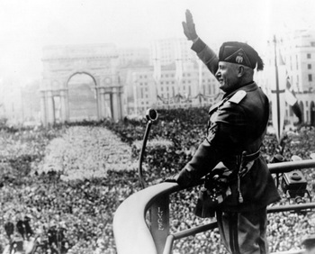 Italian dictactor Benito Mussolini saluting during a public address.jpg