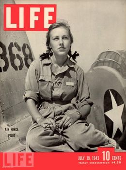 Pilot trainee Shirley Slade she sits on the wing of her Army trainer at Avenger Field, Sweetwater, Texas, July 19, 1943..jpg