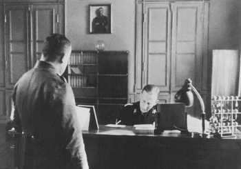 SS General Reinhard Heydrich in his office during his tenure as Bavarian police chief. Munich, Germany, April 11, 1934.jpg