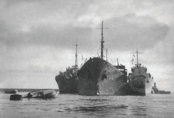 SS Ohio is heavily supported by two destroyers as she enters Grand Harbour.jpg