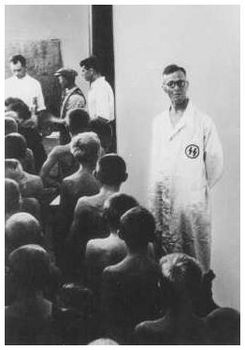 SS doctors examine Polish children judged racially valuable for adoption by Germans. Poland, October 1942..jpg