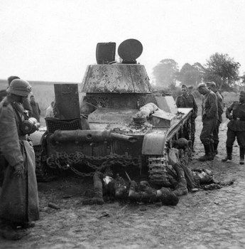 T 26 tank detroyed after a battle with German forces shows the carnage of war.jpg