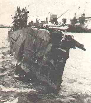 The heavily damaged U-333 returns to base.jpg