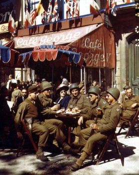 U.S. soldiers in liberated Paris at a sidewalk table at the Cafe George V.jpg