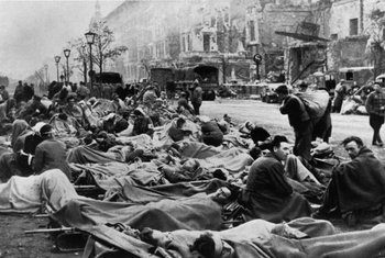 Wounded German soldiers line Unter den Linden.jpg
