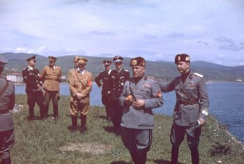 anking Nazi and Italian Fascist officials, including Hitler and Mussolini, at Santa Marinella, north of Rome, during Hitler's 1938 state visit to Italy.jpg