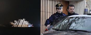 costa-concordia-night_The ship's captain gets into a police car.jpg